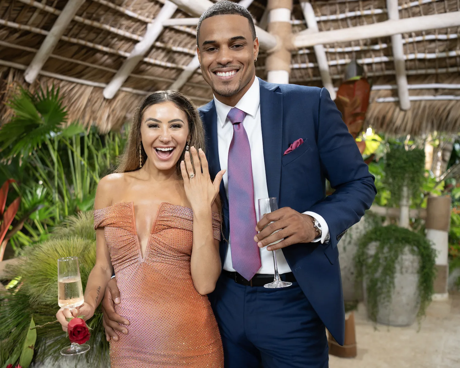 'The Bachelor' stars Grant Ellis and Juliana Pasquarosa smiling after their engagement. Juliana is holding up her hand to show off her ring.