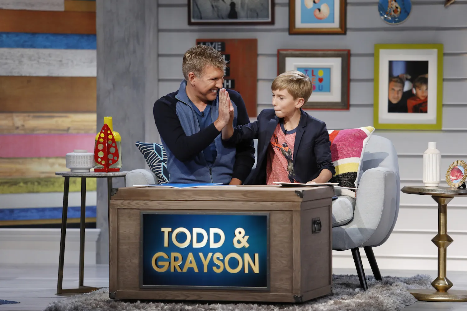 Todd and Grayson Chrisley high-fiving on 'Chrisley Knows Best'